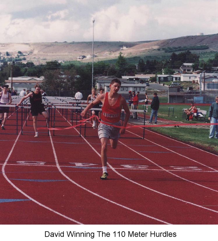 David winning the 110 meter hurdles